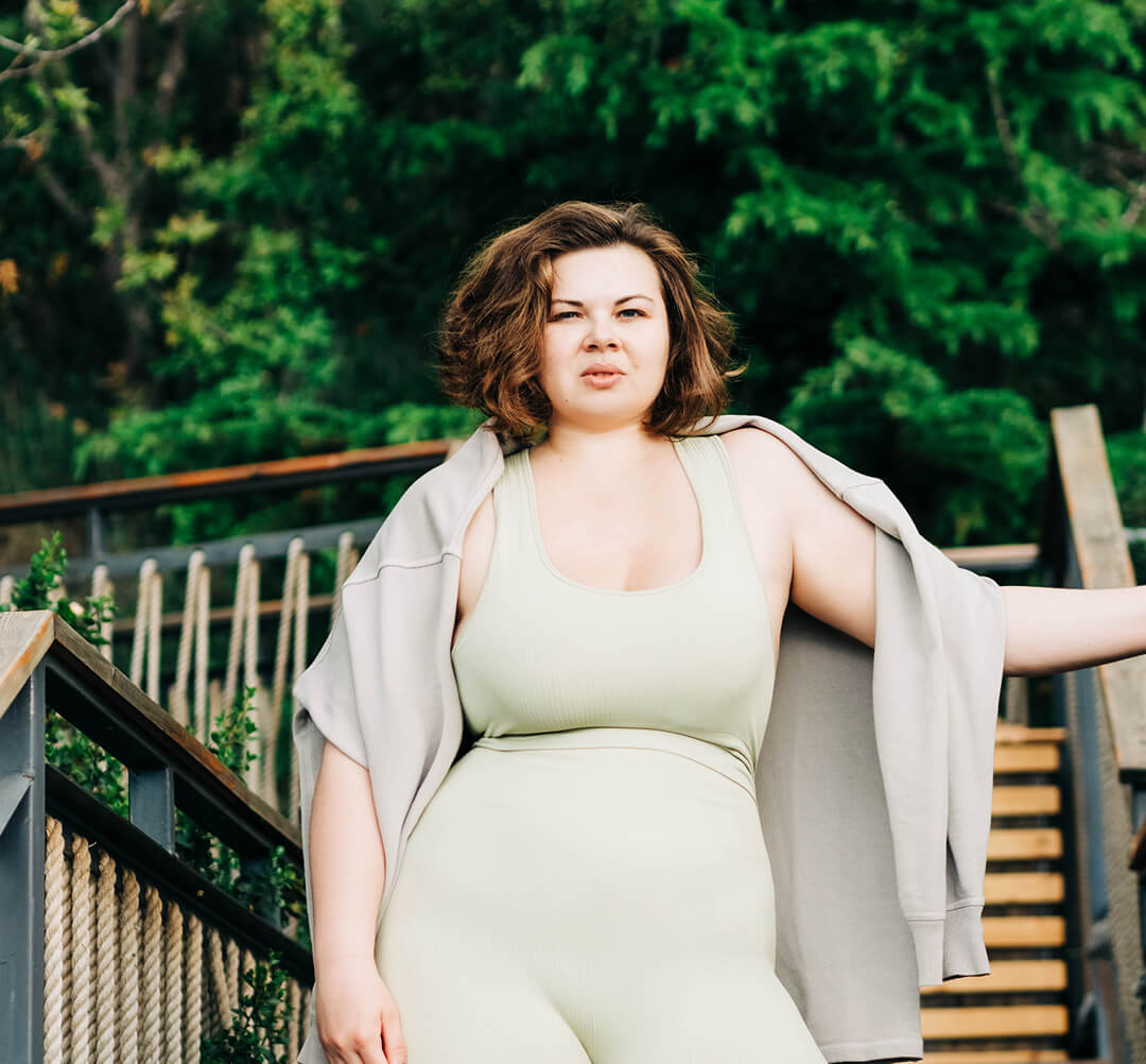 plus-size-woman-in-sportswear-standing-at-the-park-2025-01-09-05-37-52-utc 1 (1)