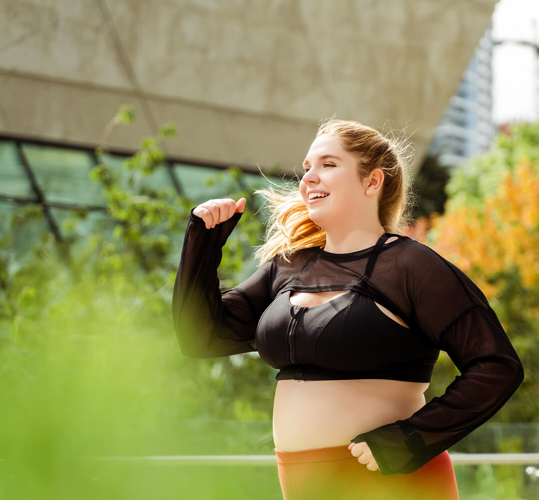 smiling-curvy-female-in-sports-clothes-jogging-out-2025-02-20-09-36-46-utc 1 (1)