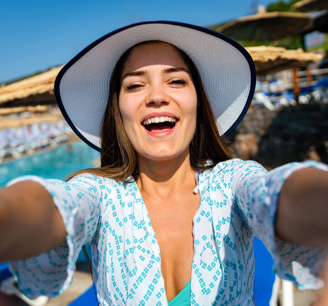 happy-woman-smiling-and-having-fun-at-beach-on-sum-2025-03-13-04-39-57-utc (2)