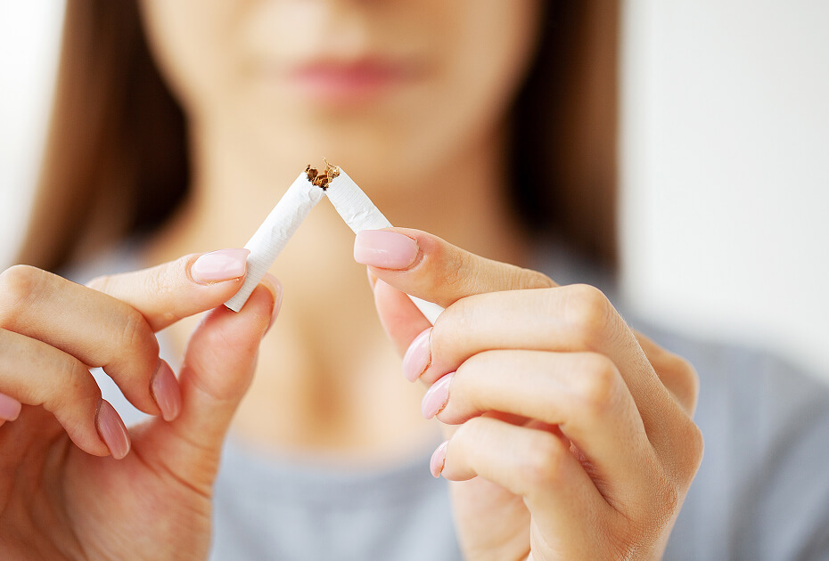 stop-smoking-woman-holding-a-broken-cigarette-2025-02-12-05-50-52-utc (2)